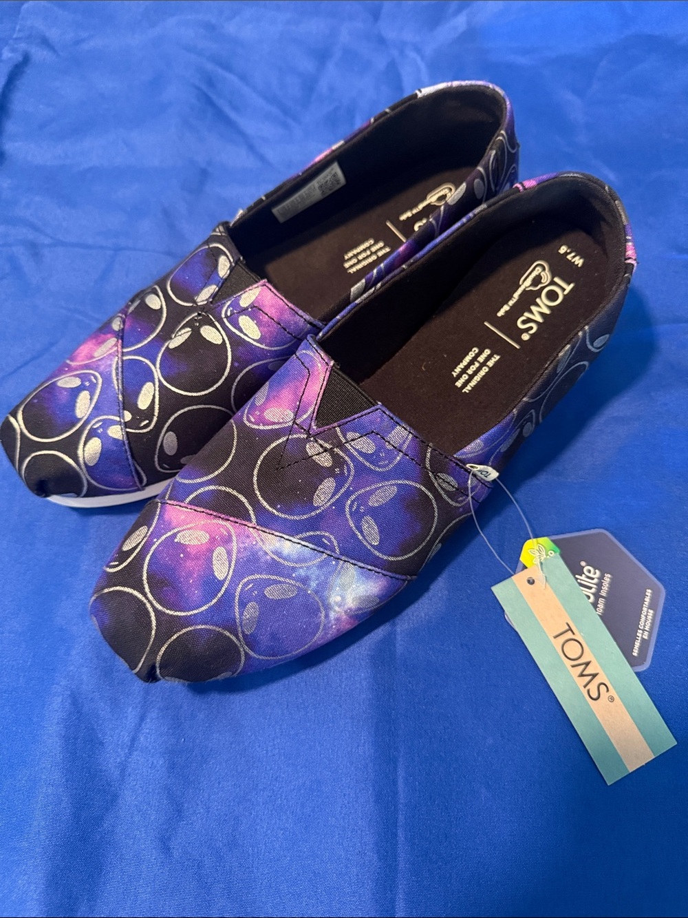 TOMS Women’s Purple Galaxy Alien Print Slip-Ons
